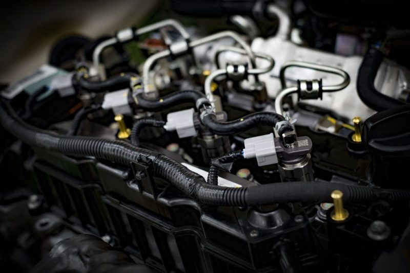 Why does a gasoline engine tick?